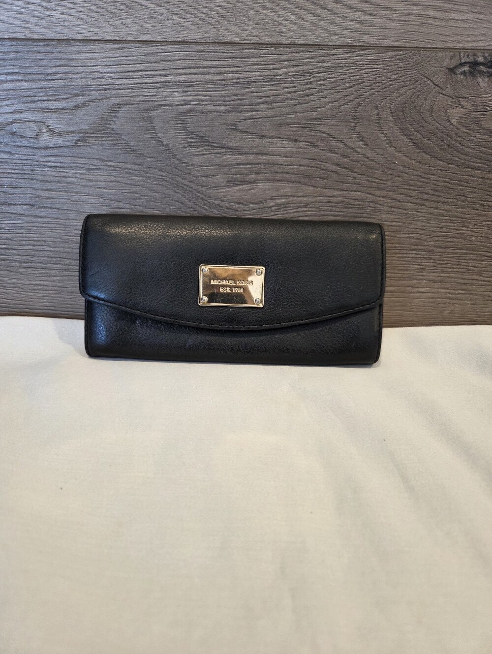 Michael Kors Black Leather Clutch Wallet with Gold Plaque